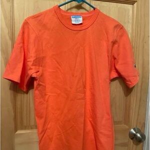 New Still has part of the tag on it, Men’s Size Small Champion T-Shirt